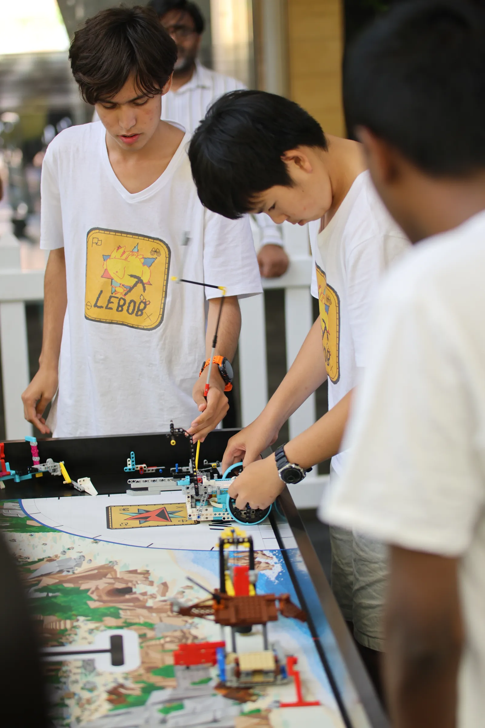 Competition — team at table